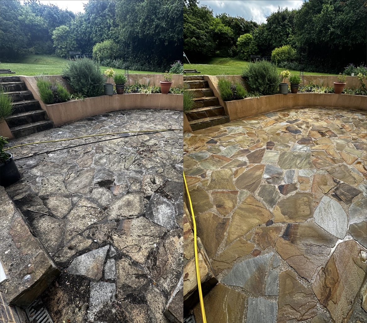 Side-by-side of an Indian sandstone patio before and after cleaning. The before photos shows a dark, dirty patio covered in moss and algae. Using pressure washing and soft washing techniques we restored the patio to a professional standard.