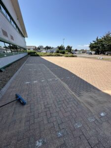 Block paving in Worthing being resanded with kiln-dried sand after a professional clean