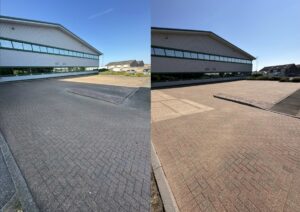 Side-by-side before and after image of block paving cleaning with pressure washer at a commercial site in Worthing
